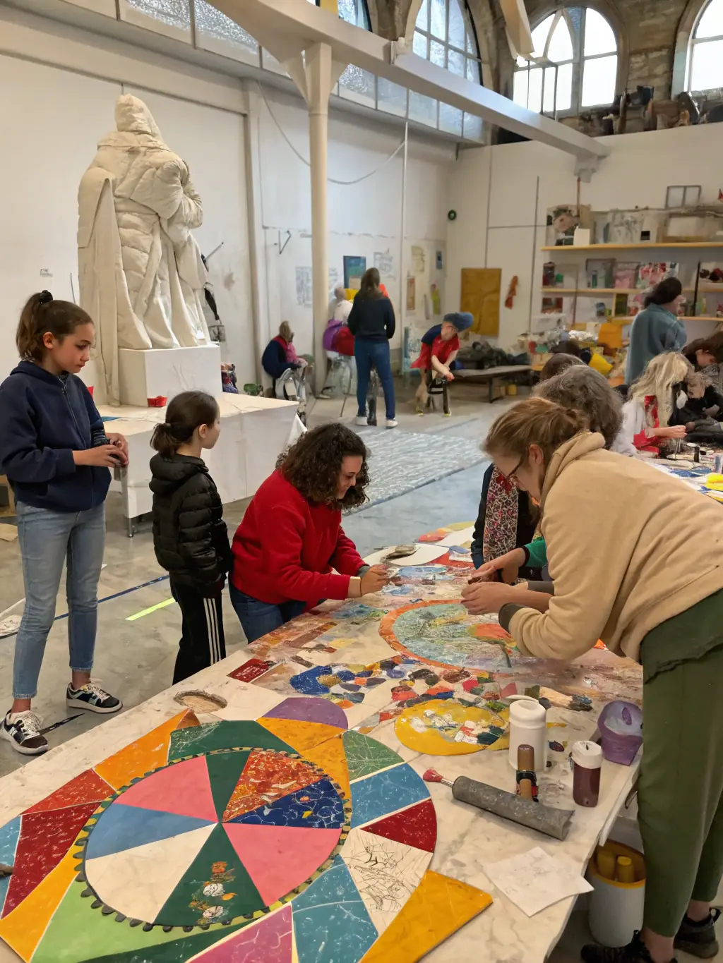 A lively picture of a community arts and crafts workshop, with participants creating various art pieces, highlighting creativity and community bonding.